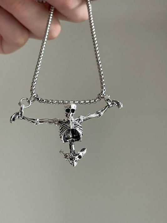 Detailed view of the silver Gothic skeleton pendant on a chain necklace by HALOBENNYA, highlighting the unique skeletal structure and craftsmanship.